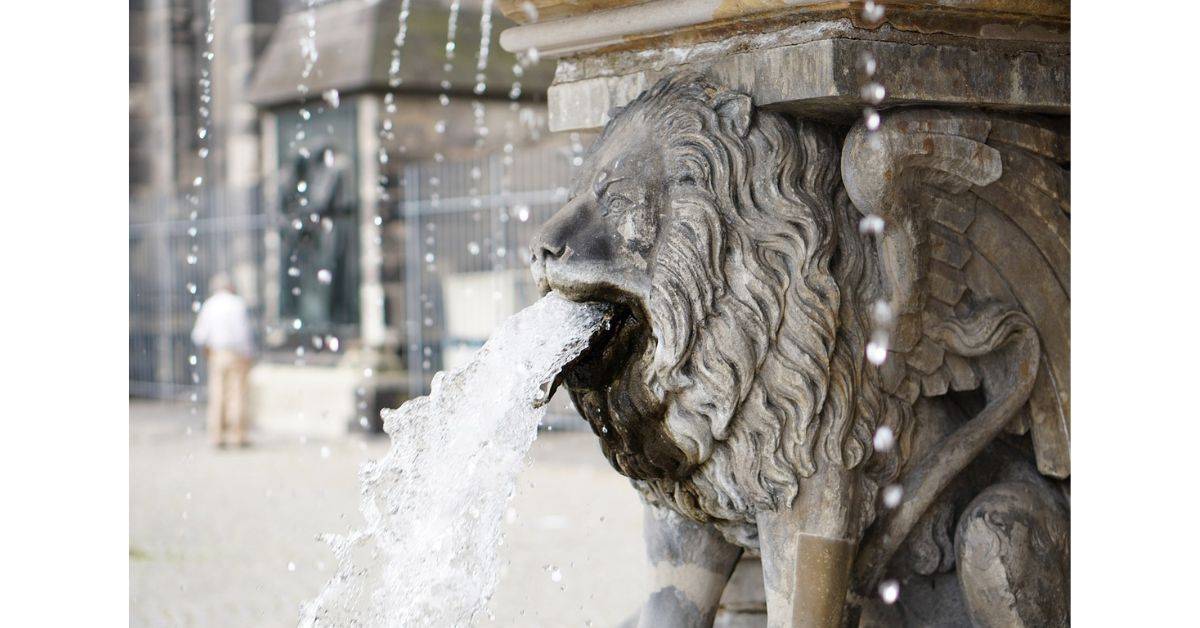 Lion sculpture spitting water
