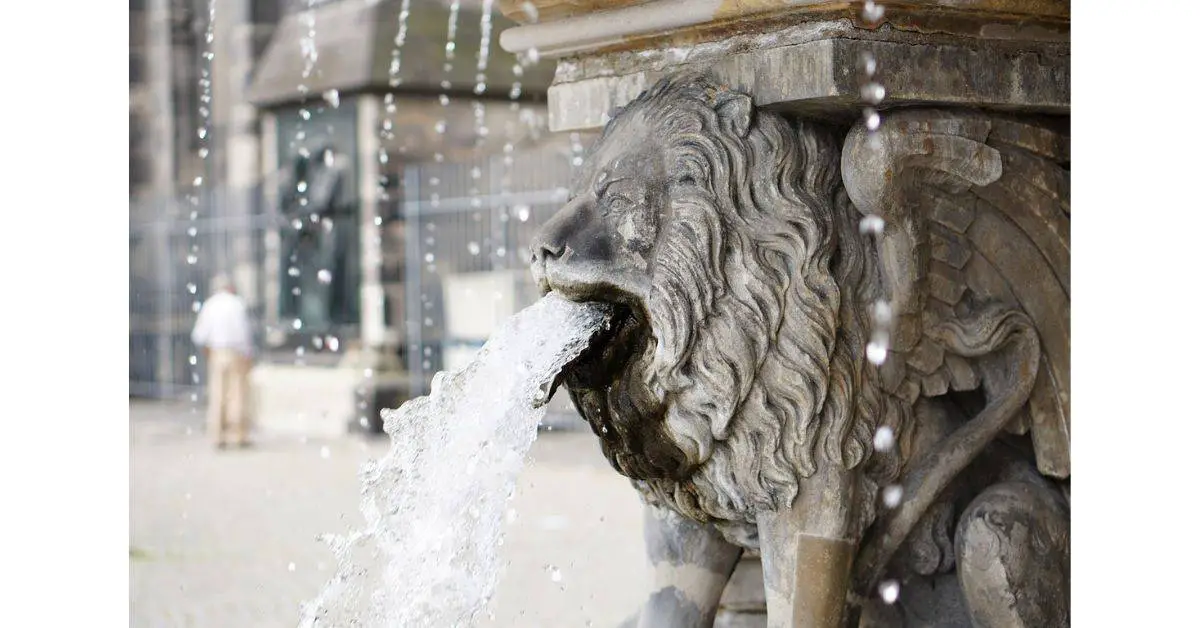 Lion sculpture spitting water