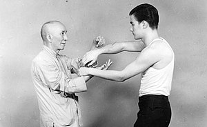 Bruce Lee and Ip Man practicing Wing Chun